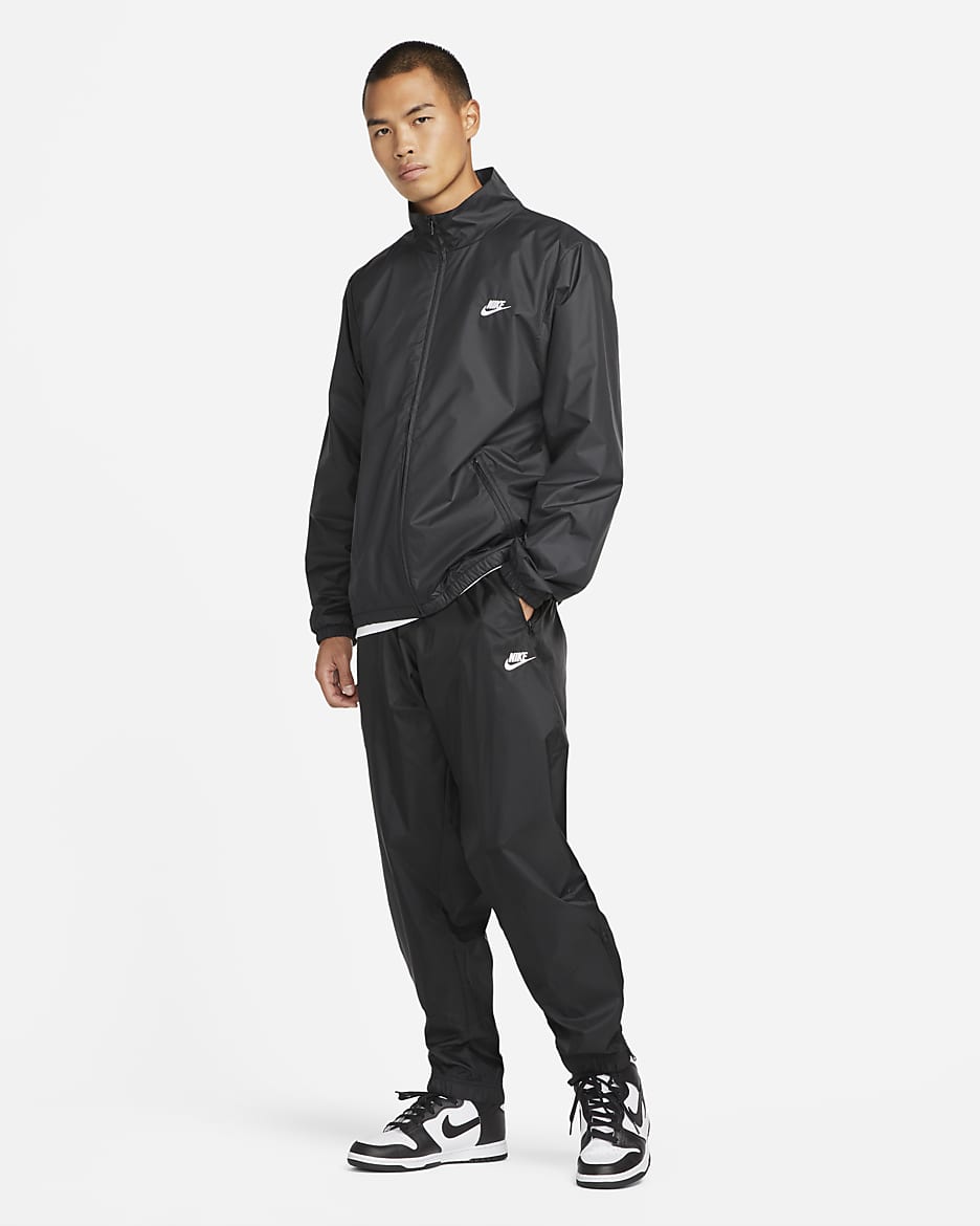 Pantalon double en tissu tisse Nike Windrunner pour homme. Nike CH